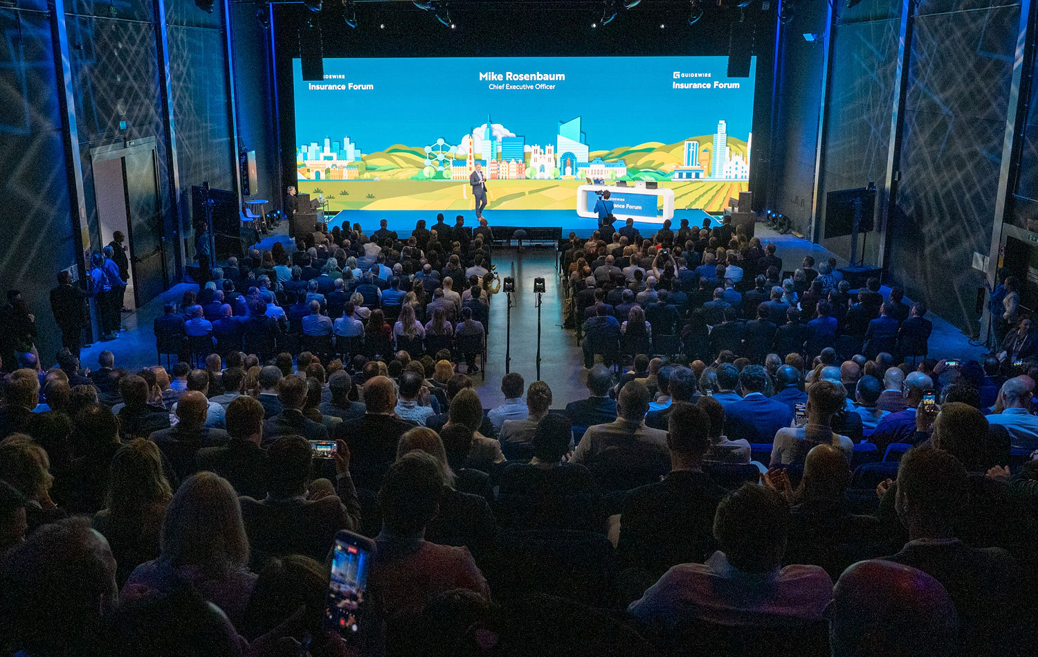 Main stage with large-format LED displays and audience